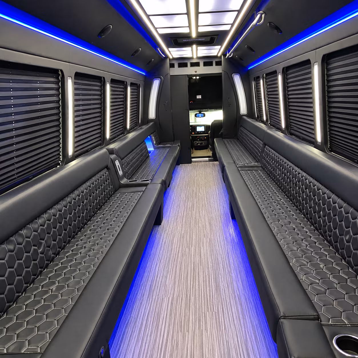 Group beside a Mercedes Sprinter limo in Palm Bay